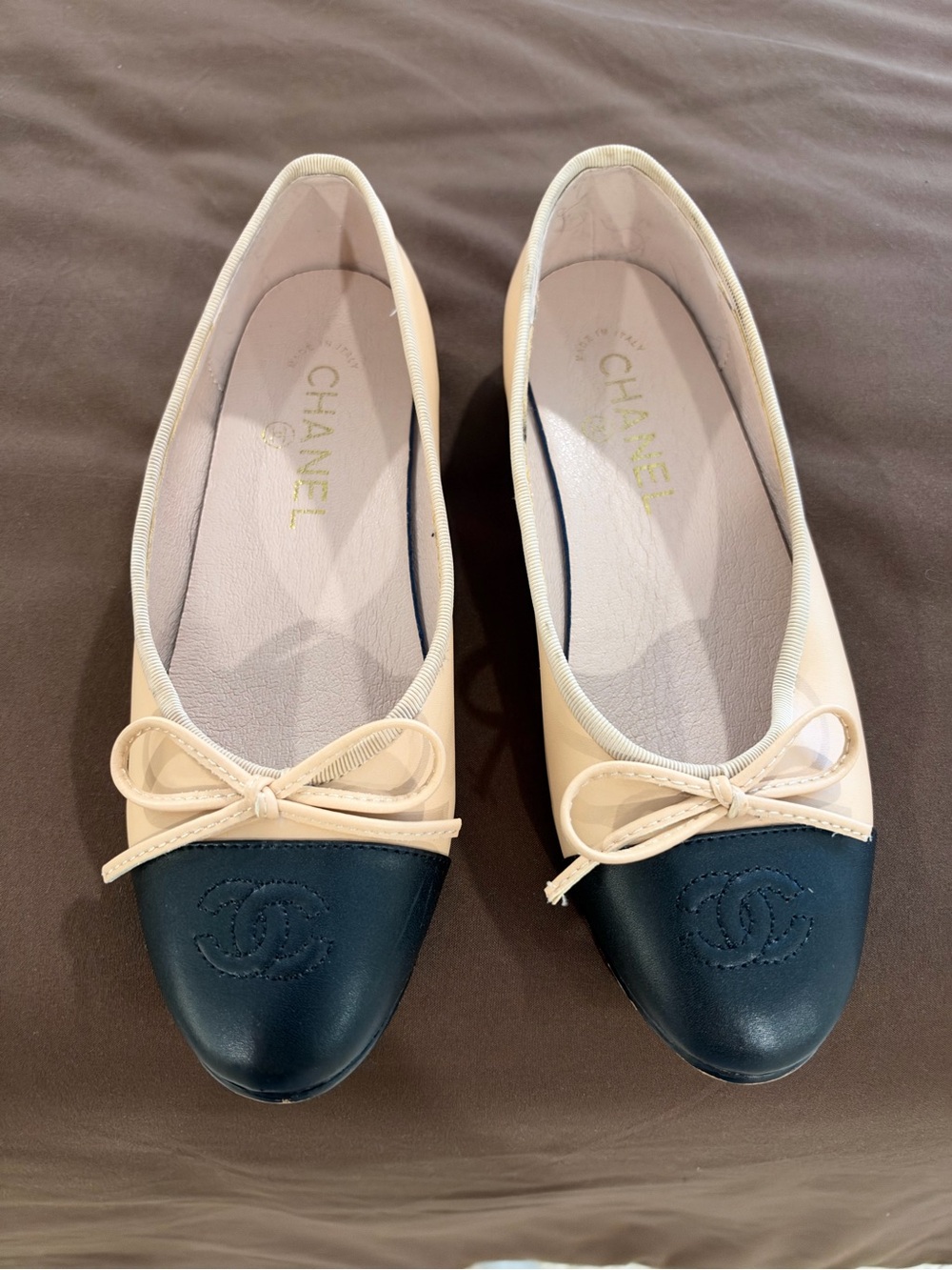 CHANEL Cream and Navy Two-Tone Cap-Toe Ballet Flats